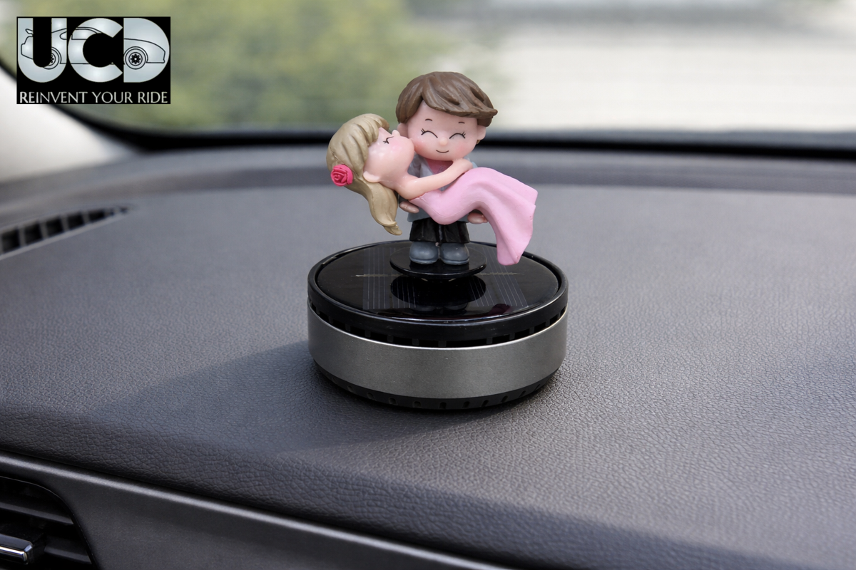Solar Powered Rotating Kissing KS04 Couple Showpiece with Aroma Diffuser Bottle – Romantic Dashboard & Home Decor