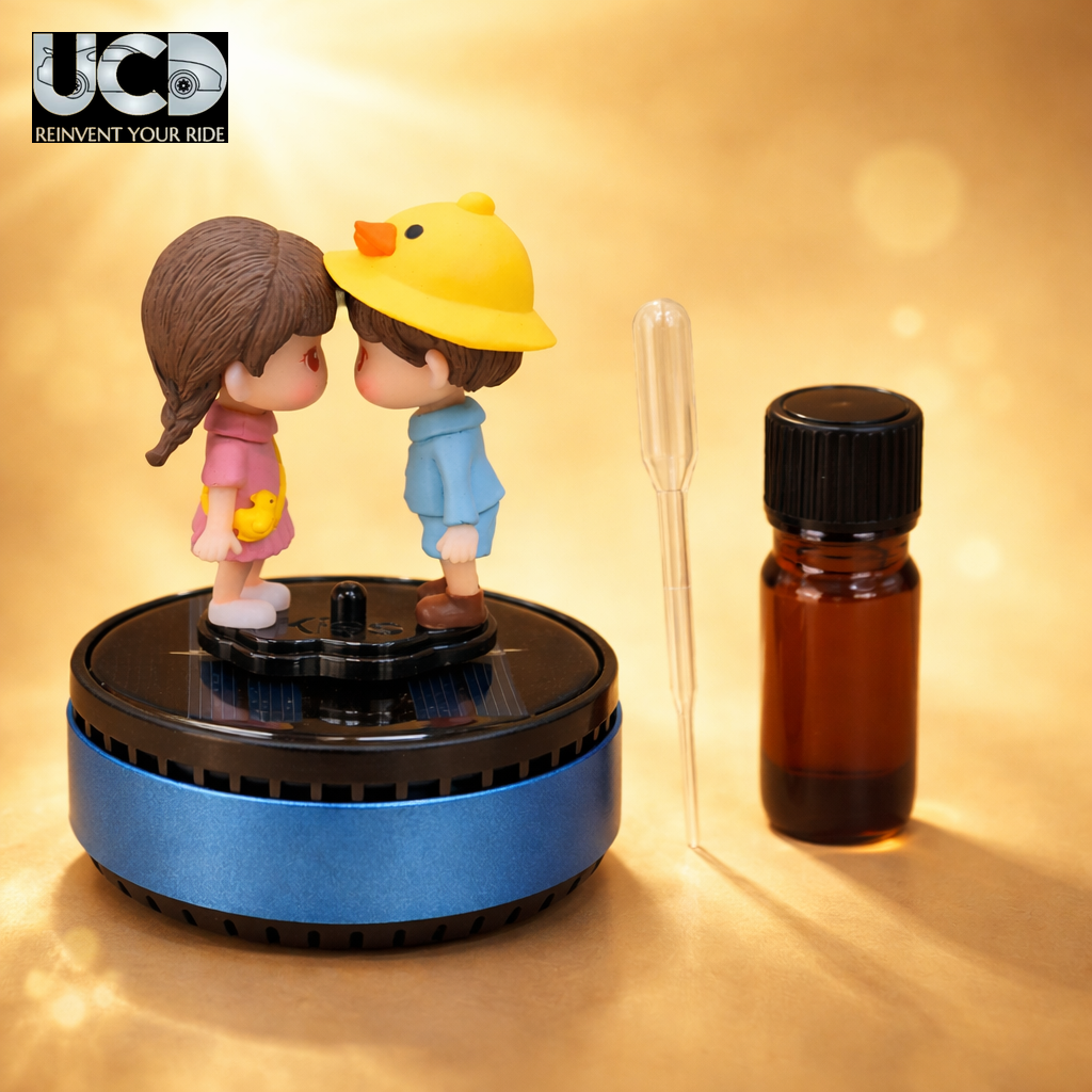 Solar Powered Rotating FH02 Couple Showpiece with Aroma Diffuser Bottle – Romantic Dashboard & Home Decor